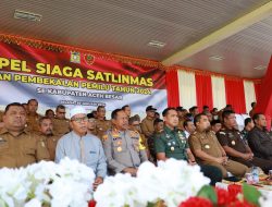 Aceh Besar Terjunkan 3.736 Satlinmas pada Pemilu 2024, Pj Bupati Iswanto Pimpin Apel Siaga