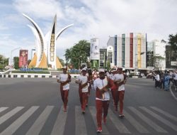 FOTO: Meriahnya Penyambutan Kirab Api PON di Banda Aceh